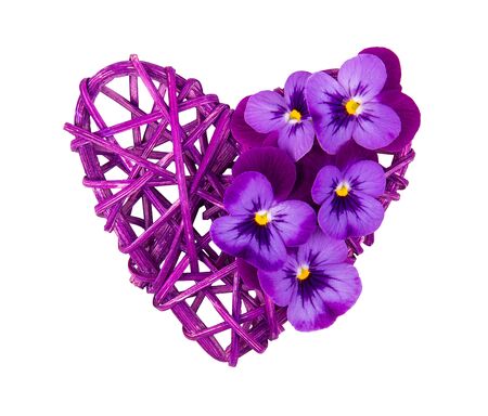 Wicker heart isolated on white background. Purple heart and flowers.の写真素材