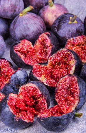 Pieces of figs close up. Beautiful purple figsの写真素材