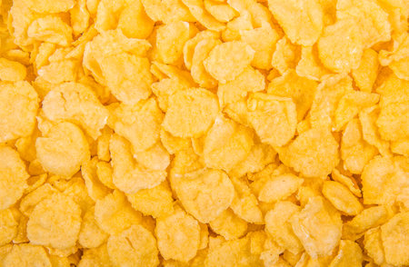 Golden corn flakes backgroundの写真素材