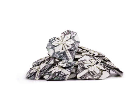 Origami heart from a bill. Paper hearts on white backgroundの写真素材