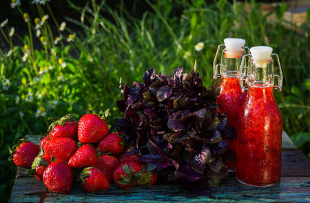 Homemade strawberry lemonade. Strawberry juice. Strawberries and basilの写真素材