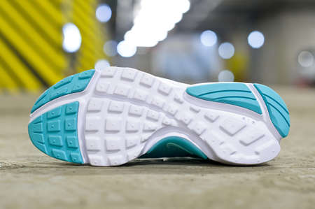 Hyper Turquoise Nike Air Presto running shoes, sneakers, trainers close up view, shot on abstract urban background at underground parking area. Krasnoyarsk, Russia - March 22, 2017のeditorial素材