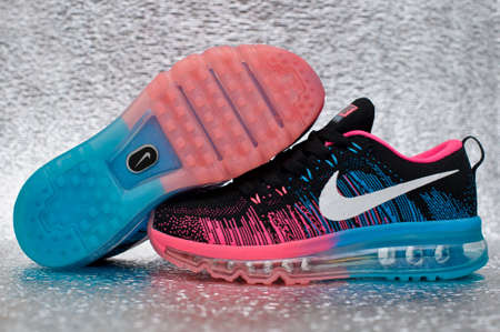 Nike Flyknit Air Max running shoes, sneakers, trainers close up view, shot on silver metallic background. Sport and casual footwear concept. Krasnoyarsk, Russia - January 15, 2016のeditorial素材