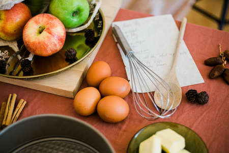 close up of kitchen utensils and ingredients prepared to make a recipeの写真素材