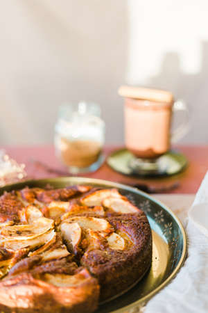 Close up of an apple pie with hot cocoa. Vertical orientation with copy spaceの写真素材