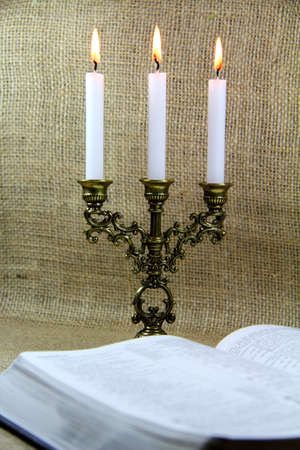 	Candlestick and open Bible
