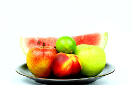 Fresh fruits on plateの写真素材