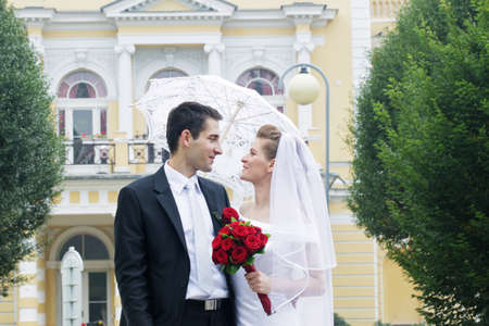 Bride and groom looking to Each Otherの写真素材