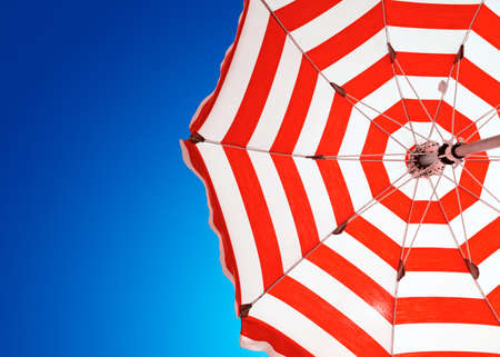 Red stripe umbrellaの写真素材