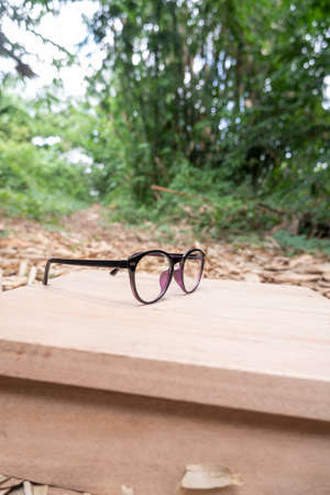 round model glasses isolated on nature background