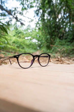 round model glasses isolated on nature backgroundの写真素材