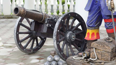 Old cannon A copy of the old cannon with cores in the style of the times of colonization of the New...