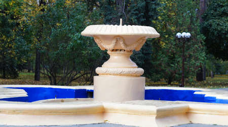 Old dry fountain in the park of Nalchik in the fall.の写真素材