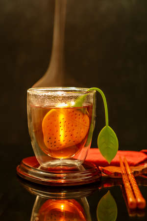 hot healthy drink Hot Tea clear Japanese tea in a glass elegant with chopsticksの写真素材
