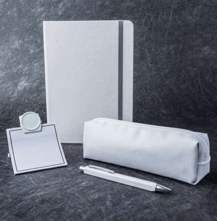 white luxury stationary template for branding in dark grey backgroundの写真素材