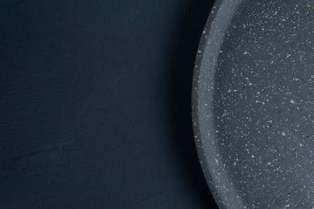 Dish of gray stone with white specksの写真素材