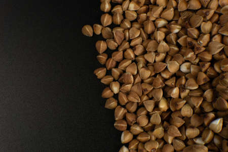Background, texture, the rump. Buckwheat. Roasted buckwheat. Useful properties of buckwheat. Garnish. Ingredient, product, cook Brown Agribusiness crop organic farming Dietary productの写真素材