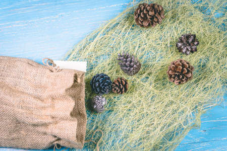 Christmas balls and bumps on a blue backgroundの写真素材