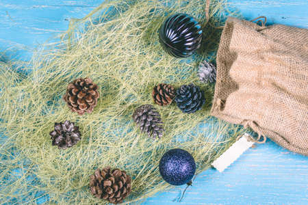 Christmas balls and bumps on a blue backgroundの写真素材