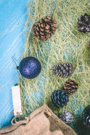 Christmas balls and bumps on a blue backgroundの写真素材