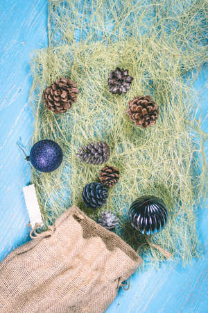 Christmas balls and bumps on a blue backgroundの写真素材