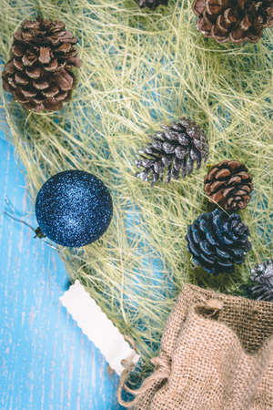 Christmas balls and bumps on a blue backgroundの写真素材