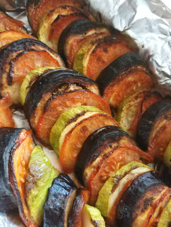 Baked vegetables. Courgettes, tomatoes and eggplant Vegetarianの写真素材
