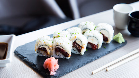 Vegan uramaki. Type of sushi covered with rice on the outside and filled with a combination of vegetables.の写真素材
