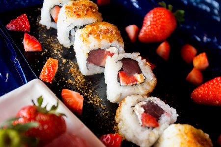 Tuna uramaki with strawberry in Japanese restaurant.の写真素材