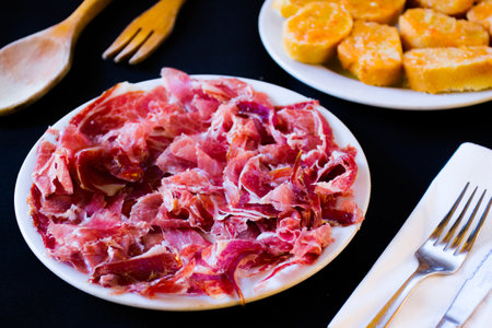 Plate with Iberian ham. Top quality Spanish ham from the Extremadura area.の写真素材