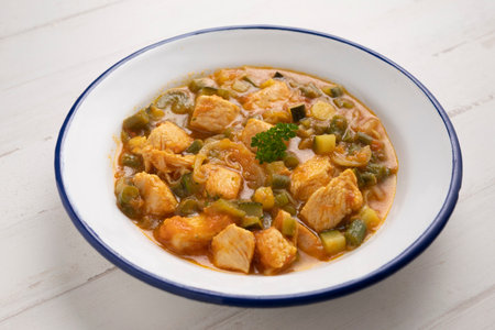 Braised turkey curry with green beans and diced potatoes.の写真素材