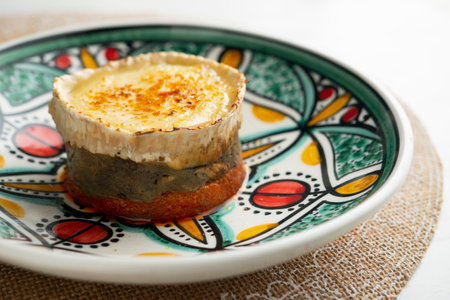 Sobrasada with baked aubergine with caramelized goat cheese. Cover of the island of Majorca.の写真素材