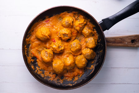 Meatballs with tomato sauce and vegetables. Traditional Spanish cover.の写真素材