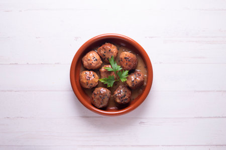 Meatballs with tomato sauce and vegetables. Traditional Spanish cover.の写真素材