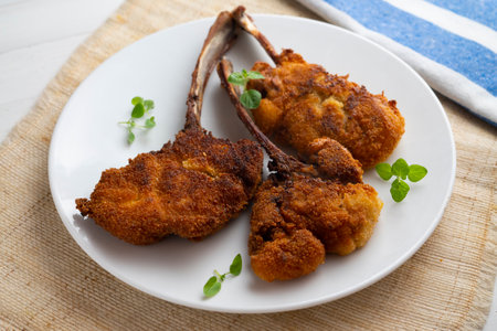 Villeroy style roasted lamb chops. Breaded and fried.の写真素材