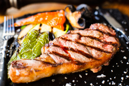 Top quality grilled veal T-bone steak served in a restaurant in the Basque Country region of Spain.の写真素材