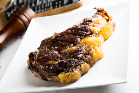 Top quality grilled veal T-bone steak served in a restaurant in the Basque Country region of Spain.の写真素材