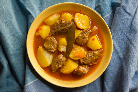 Braised beef with potatoes and carrots.の写真素材
