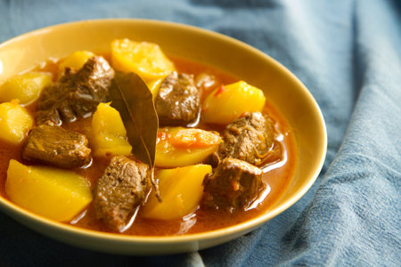 Braised beef with potatoes and carrots.の写真素材