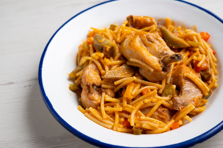 Recipe Fideua with rabbit. Casserole noodles with meat. Traditional Spanish cover.の写真素材
