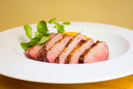 Baked duck magret with salad.の写真素材