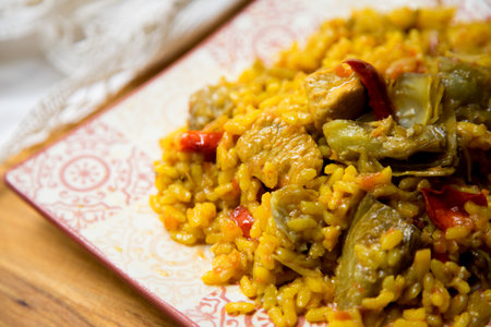 Baked chicken rice paella with vegetables. Traditional Spanish recipe.の写真素材