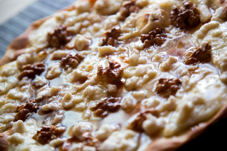 Sweet pizza with fresh cheese, nuts and honey. Neapolitan pizza made with Italian Recipe.の写真素材
