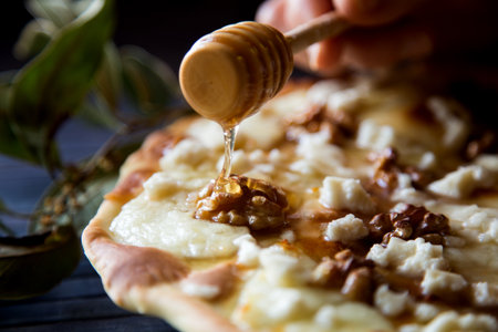 Sweet pizza with fresh cheese, nuts and honey. Neapolitan pizza made with Italian Recipe.の写真素材