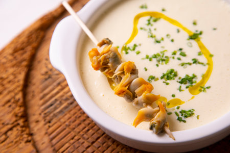 Cream of cockles with cream. Traditional Spanish tapas recipe.の写真素材
