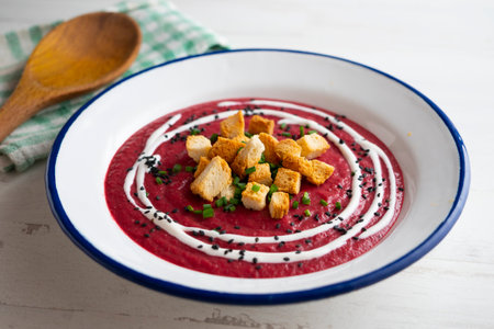 Creamy beetroot and vegetable soup with toasted bread. Traditional Spanish tapa recipe.の写真素材