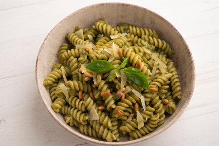 Pasta with pesto. Pesto is a typical seasoning or sauce originating from Liguria. Its main ingredient is basil or better, Genovese basil.の写真素材
