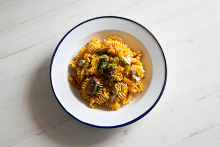 Pasta with tomato and sardines. Traditional Italian recipe.の写真素材