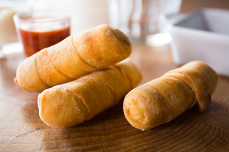 TequeÃ±o is a fried breaded cheese stick or bread dough spear with white cheese stuffed in the...