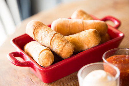 TequeÃ±o is a fried breaded cheese stick or bread dough spear with white cheese stuffed in the...
